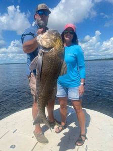 Two people fishing at Santa Rosa Beach, Florida