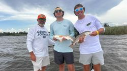 2 redfish caught during fishing trip in Santa Rosa Beach