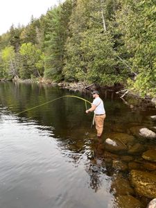 An angler fishing in Brownville