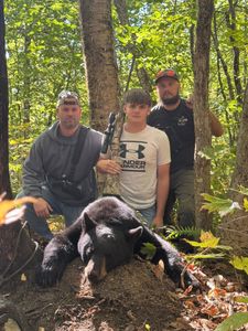 3 people fishing and hunting in Maine