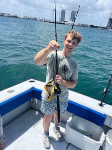 Angler posing with one fish in FL
