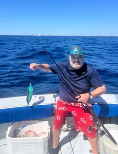 Angler with fishing rod enjoying the outdoors in FL