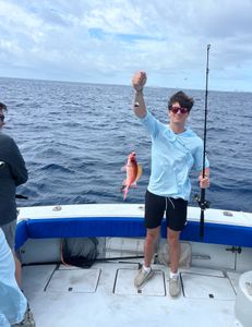 Anglers enjoying a fishing tour in West Palm Beach