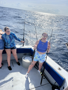 "A day well spent on the open waters, reeling in a bountiful catch."