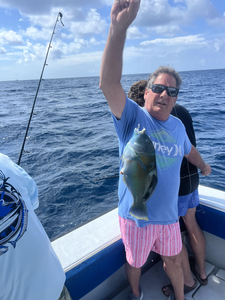 Battling the waves at the Riviera Beach City Marina with expert deep sea fishing techniques.