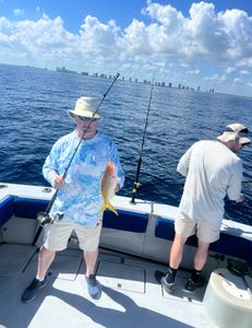 Two people fishing in Florida with best, great text