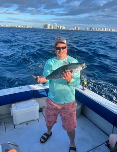Fisherman enjoying scenic West Palm Beach view