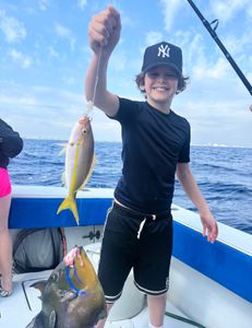 Two 14-inch fish caught during fishing tours in West Palm Beach