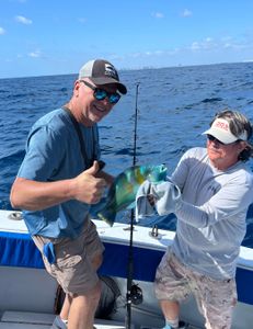 Angler reeling in a fishing trophy in Florida