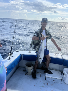 Reeled in this little tunny during a stormy day of fishing off the coast of West Palm Beach!