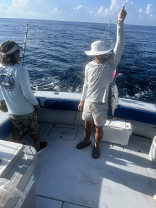 Reeling in a 14-inch Little Tunny off West Palm Beach's coast!