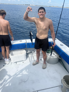 Reeling in a Little Tunny off West Palm Beach - the best fishing spot!