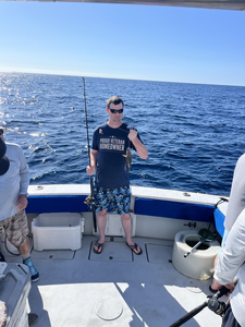 Peaceful day on the water, reeling in a catch.