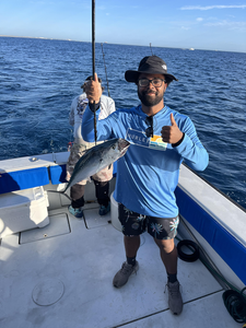 Reeling in the big one on a beautiful day.