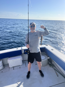 Reeling in the big ones out on the open waters.