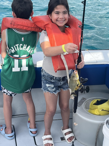 Reeling in the catch of the day on the open waters.