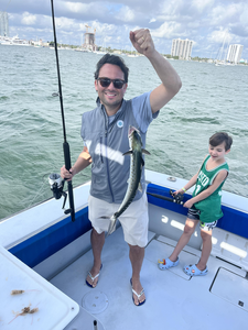 Reeling in the catch off the city skyline.