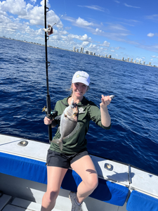 Reeling in a good catch on the high seas.