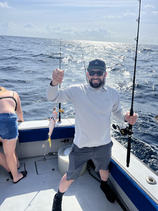 Reeling in a good catch on the open waters.