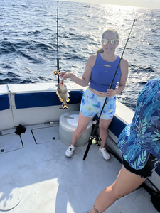Reeling in a good time on the open waters.