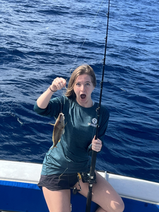 Reeling in a peaceful day on the open waters.