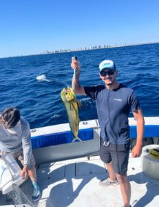 Angler with a 16-inch fish in West Palm Beach, Florida