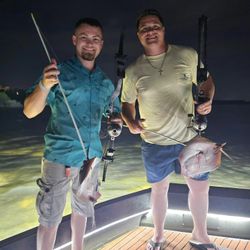 Two people fishing in FL