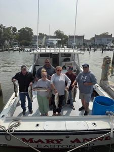 4 fishing rods with a group of 6 people in MD