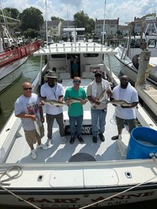Group of 7 people fishing in MD
