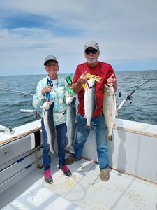Happy guests after a full-day charter