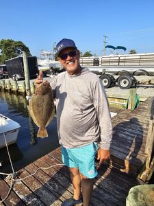 Caught a 13-inch summer flounder in Tuckerton, fishing