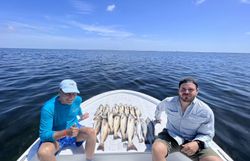 South Padre Island fishing, prized redfish catch.