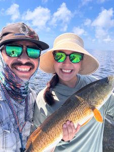 Two people fishing in TX