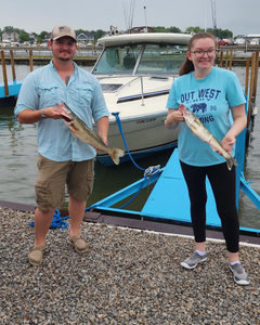 Two fishermen with two fish in OH