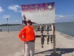 Fresh caught redfish and black drum displayed on fishing cleaning station in Rockport TX