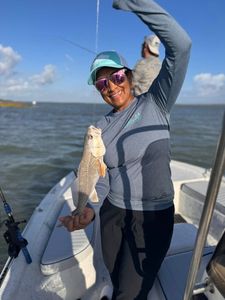 Successful redfish catch on fishing boat in Rockport Texas waters
