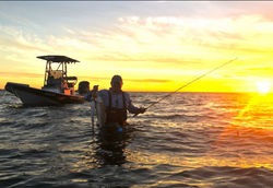 A person fishing in Galveston