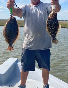 Two large southern flounder caught fishing in TX