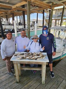 4 people enjoying a great fishing trip in LA