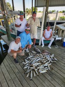 Group of 5 people fishing in New Orleans