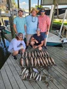Five people fishing in New Orleans