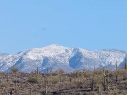 Exploring the rugged beauty of the desert mountains.
