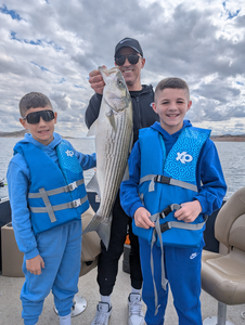 A peaceful day on the lake, with a catch or two to share.