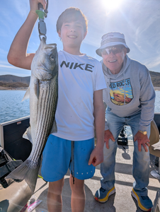 Peaceful day on the water reeling in a catch.
