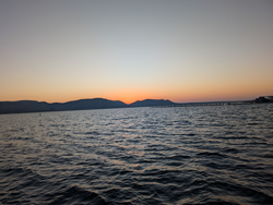 Peaceful sunset over the lake, with a bountiful catch.