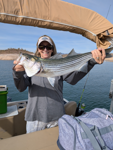 Reeled in a big one on the serene waters!
