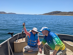 Relaxing day out on the lake reeling in the catch.