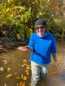 Angler with a small fish in Arlington