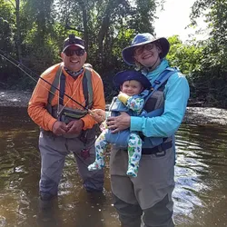 Three people fishing in VT