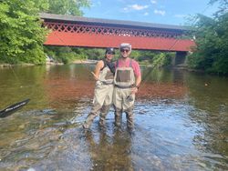 Two people fishing in Vermont